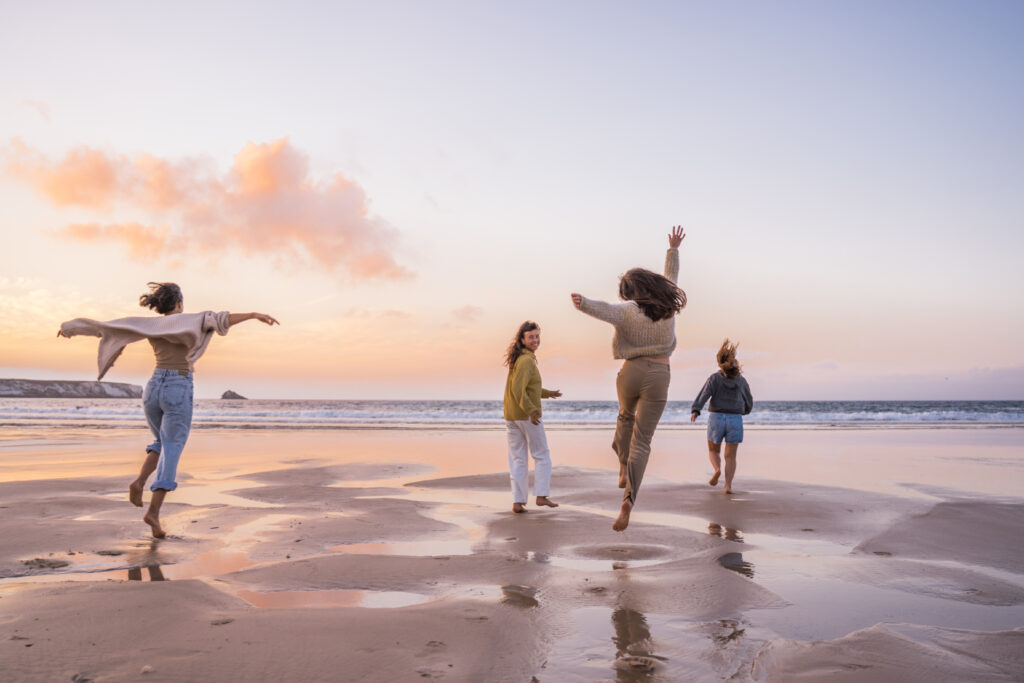 happy women at the beach