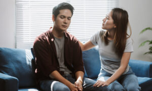 woman talking to her family about rehab