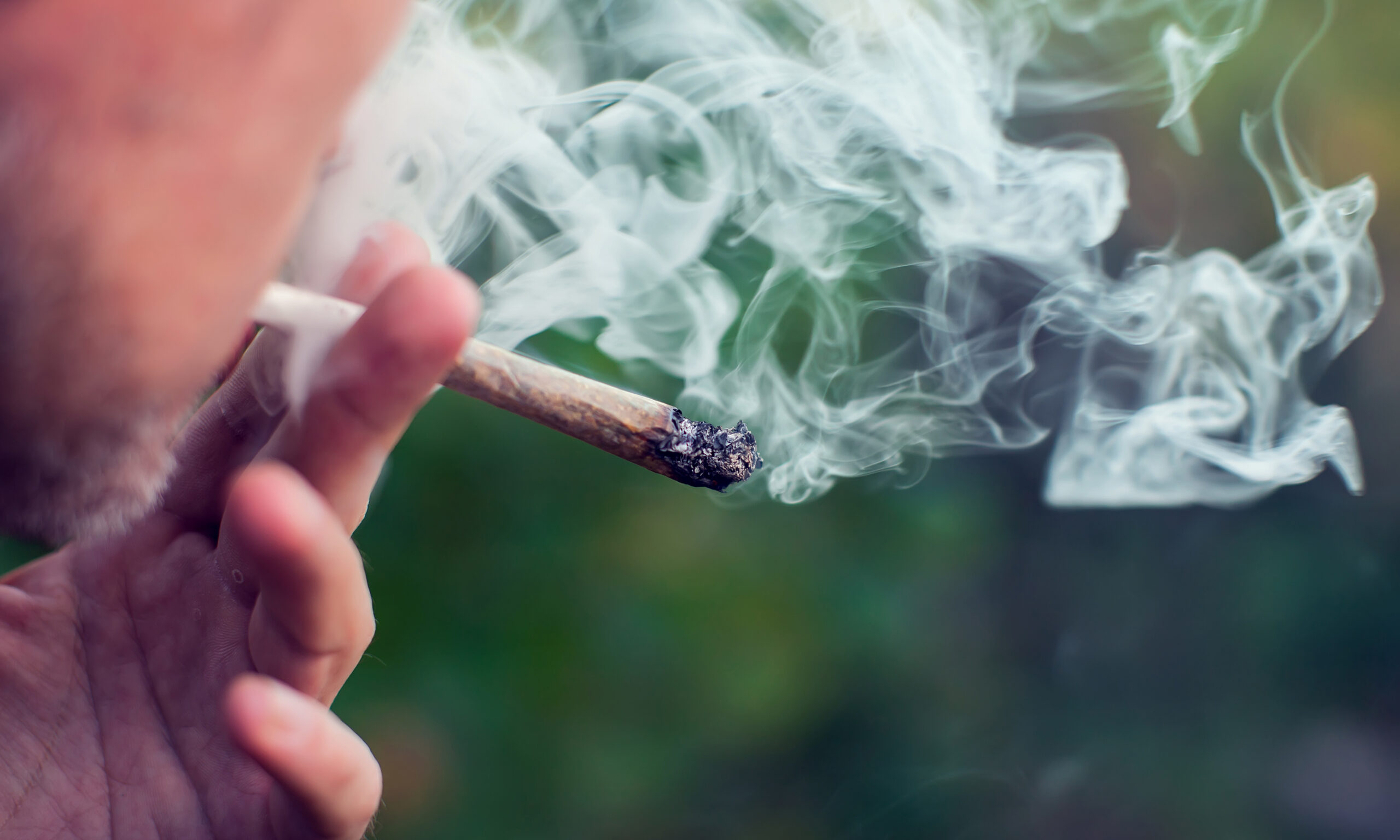 person smoking marijuana
