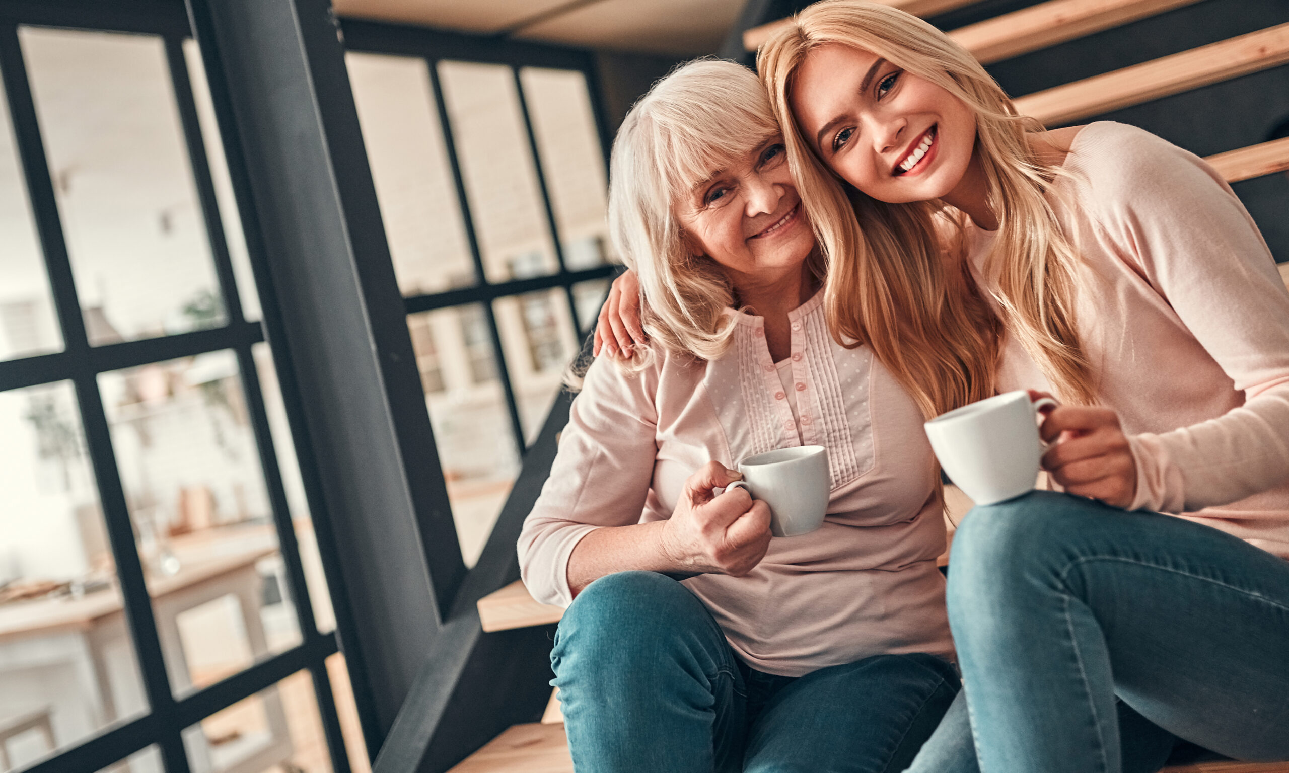 mother supporting her daughter